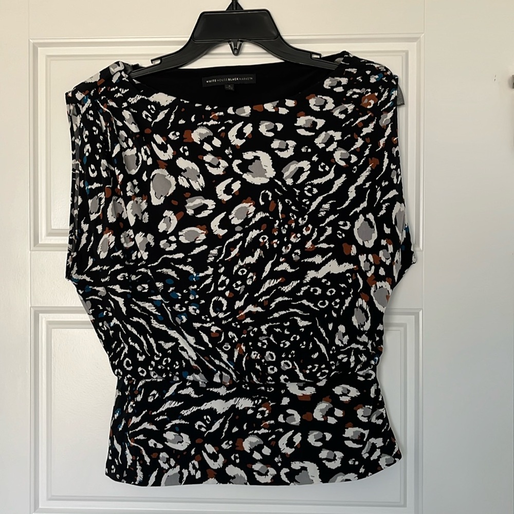 White House Black Market sleeveless shirt. Size small.